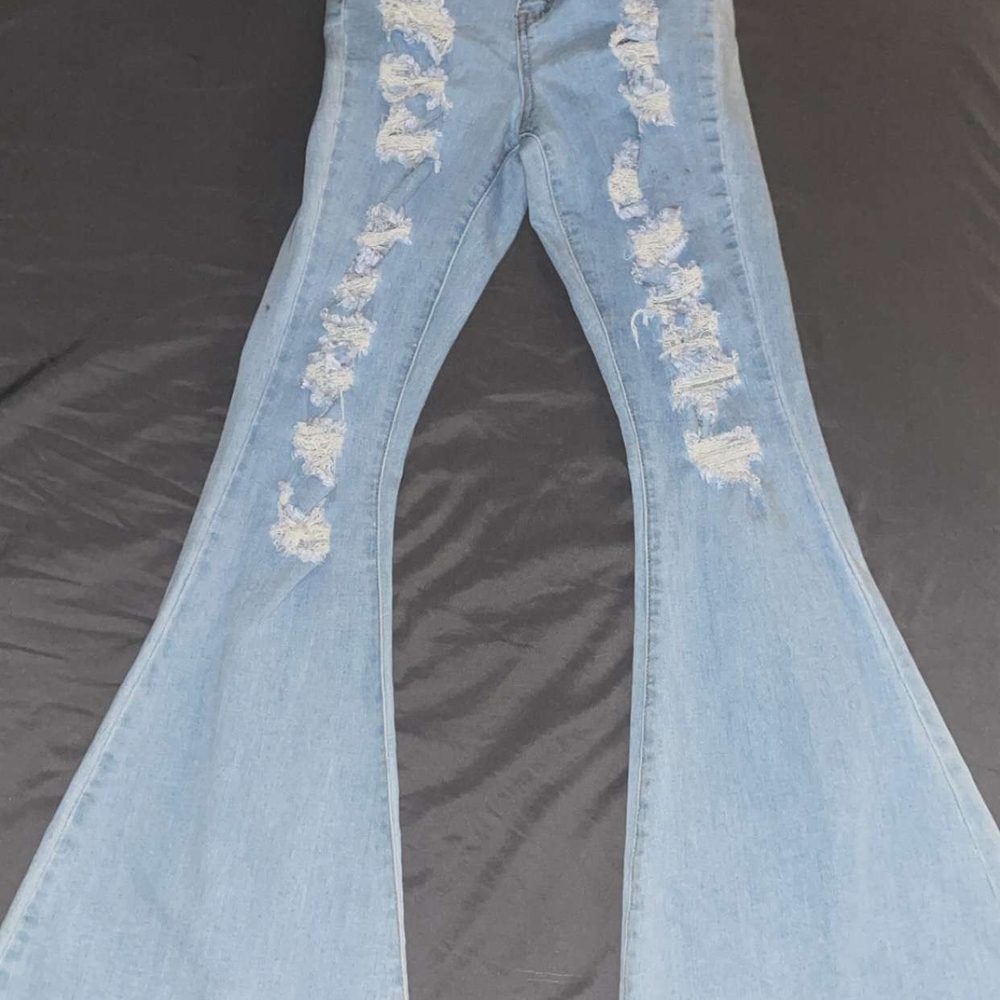 Distressed Light Blue Flare Jeans